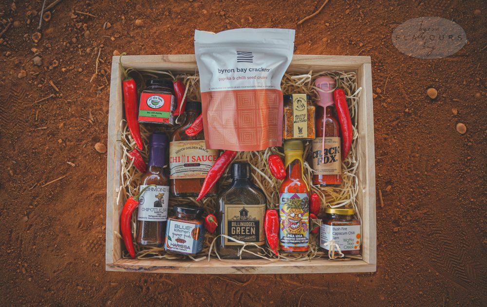 Byron Bay Hotties - Chilli Hot hampers. Wow this one will really appeal to the chilli lovers! If your gift recipient LOVES hot food, send them this hamper! Hot Chilli sauces a-plenty, as well as beaut blends with killer flavour punches. Did we mention the tastiest crackers to ever grace our shores?